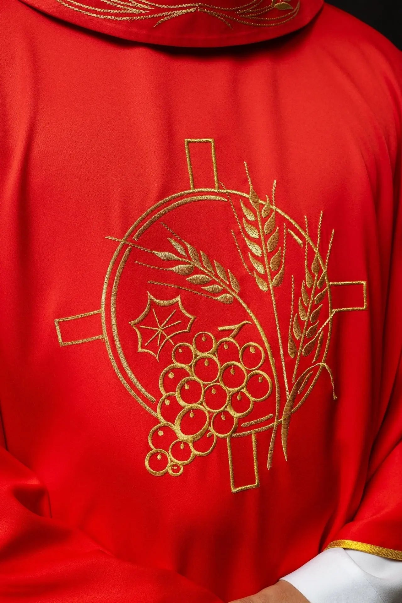 Chasuble with embroidered cross and red ear motifs