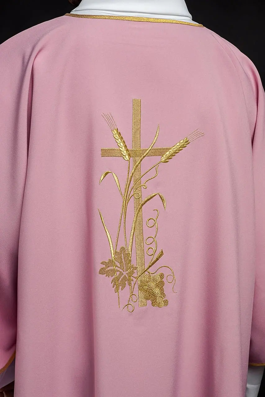 Pink dalmatica with gold Pax cross embroidery