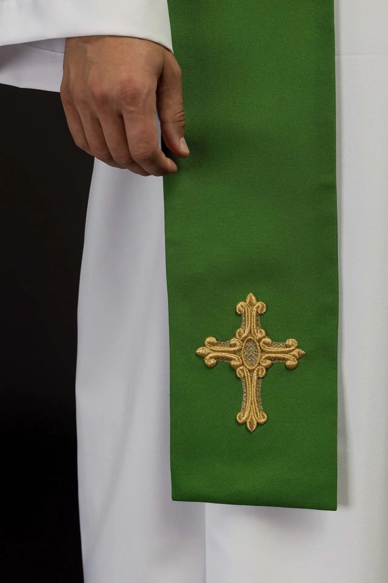 Green priest's stole embroidered with cross and IHS Green