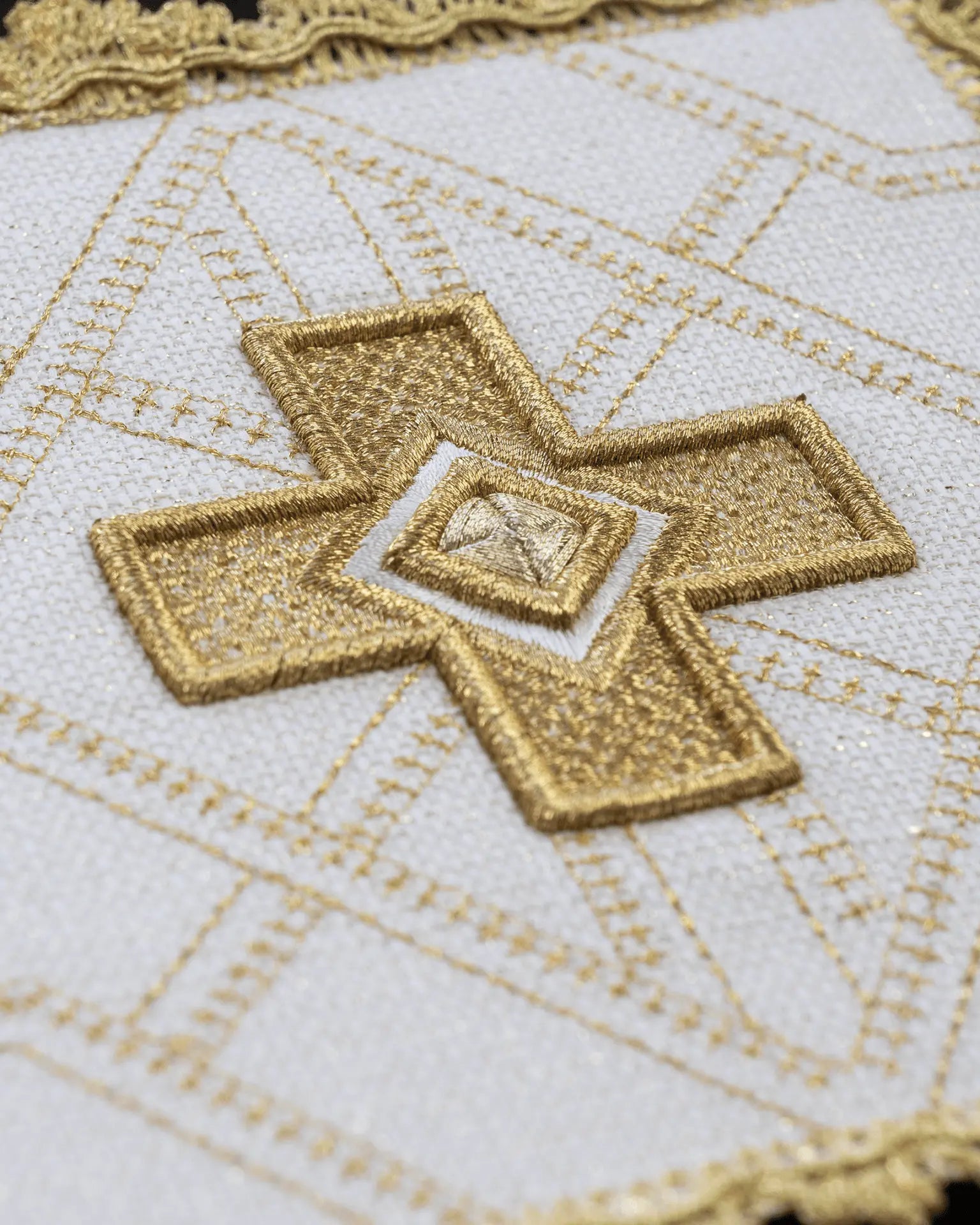 Set of four stakes with gold embroidery