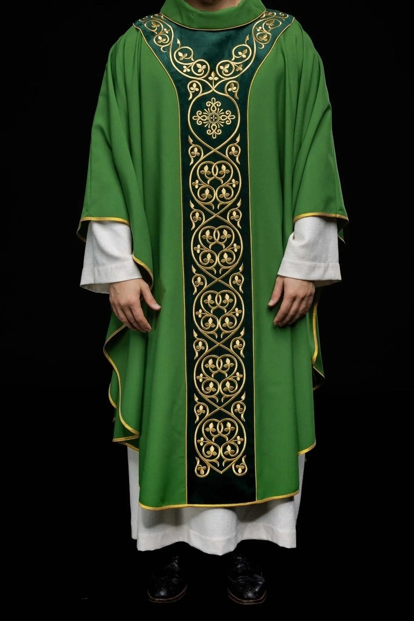 Green liturgical chasuble decorated with embroidery on velvet