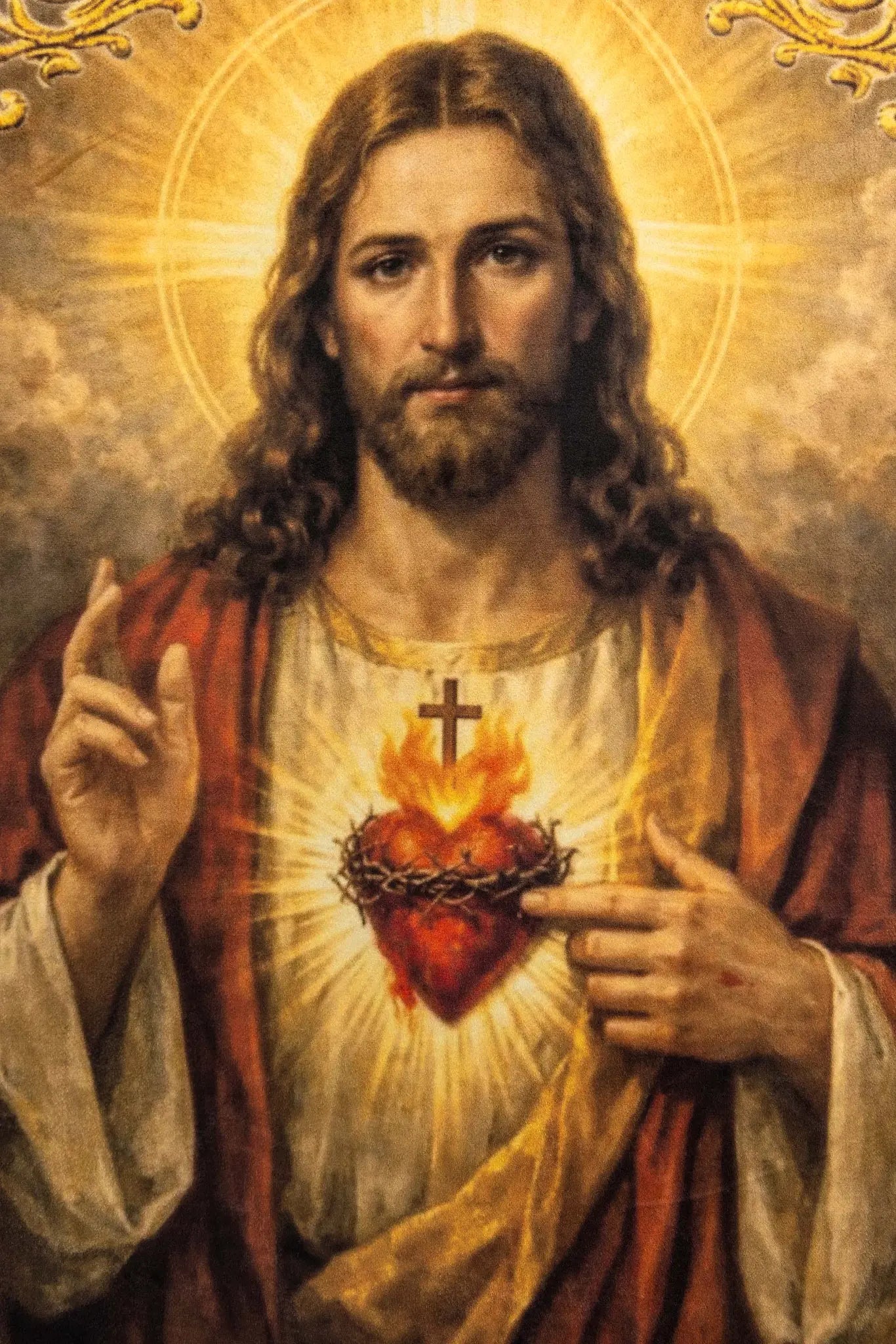 Double-sided printed processional banner featuring the Sacred Heart of Jesus on one side and an IHS chalice with host on the other, with gold ornaments and burgundy accents.