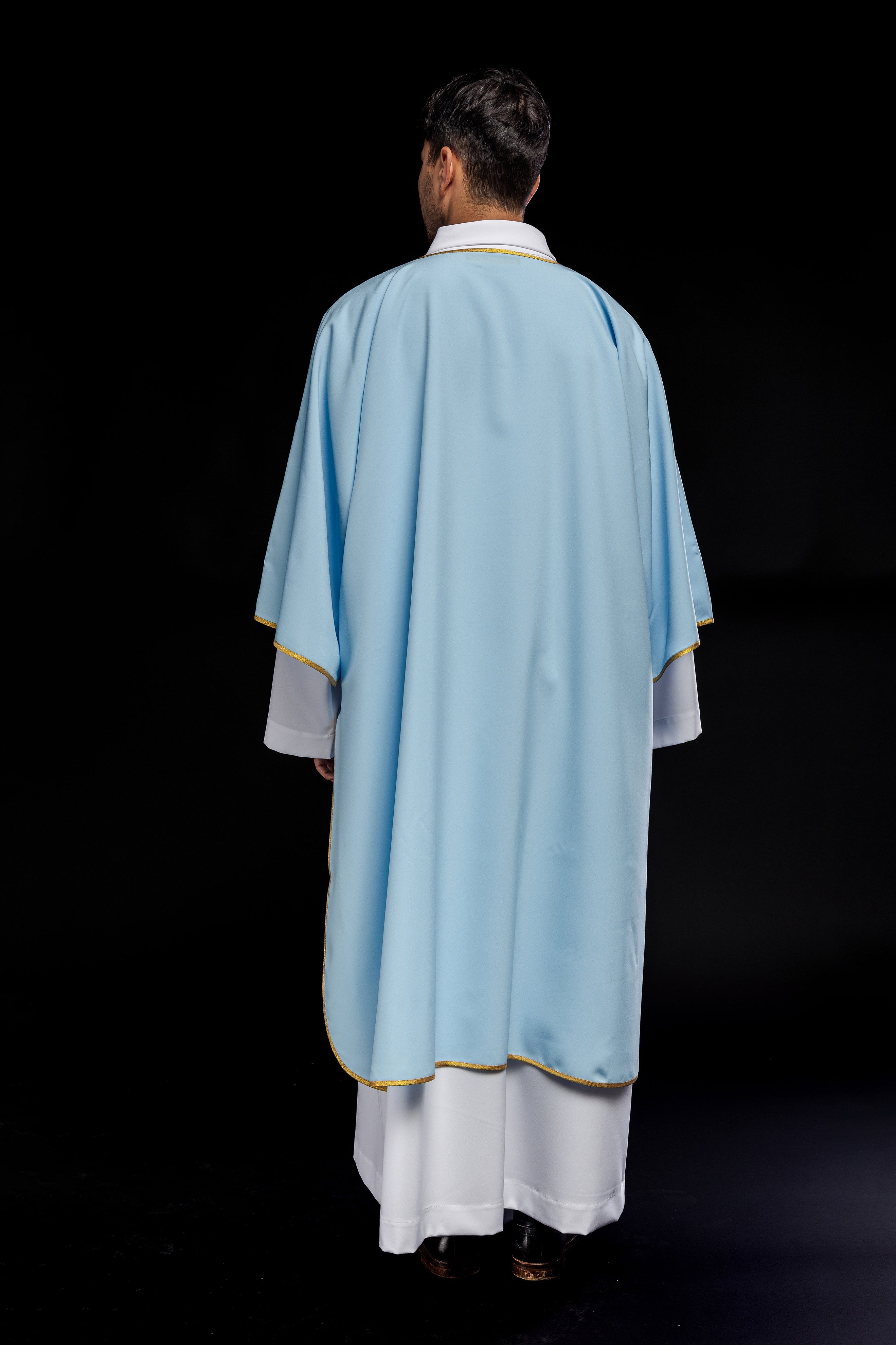 Dalmáticas lisas con ribete dorado azul