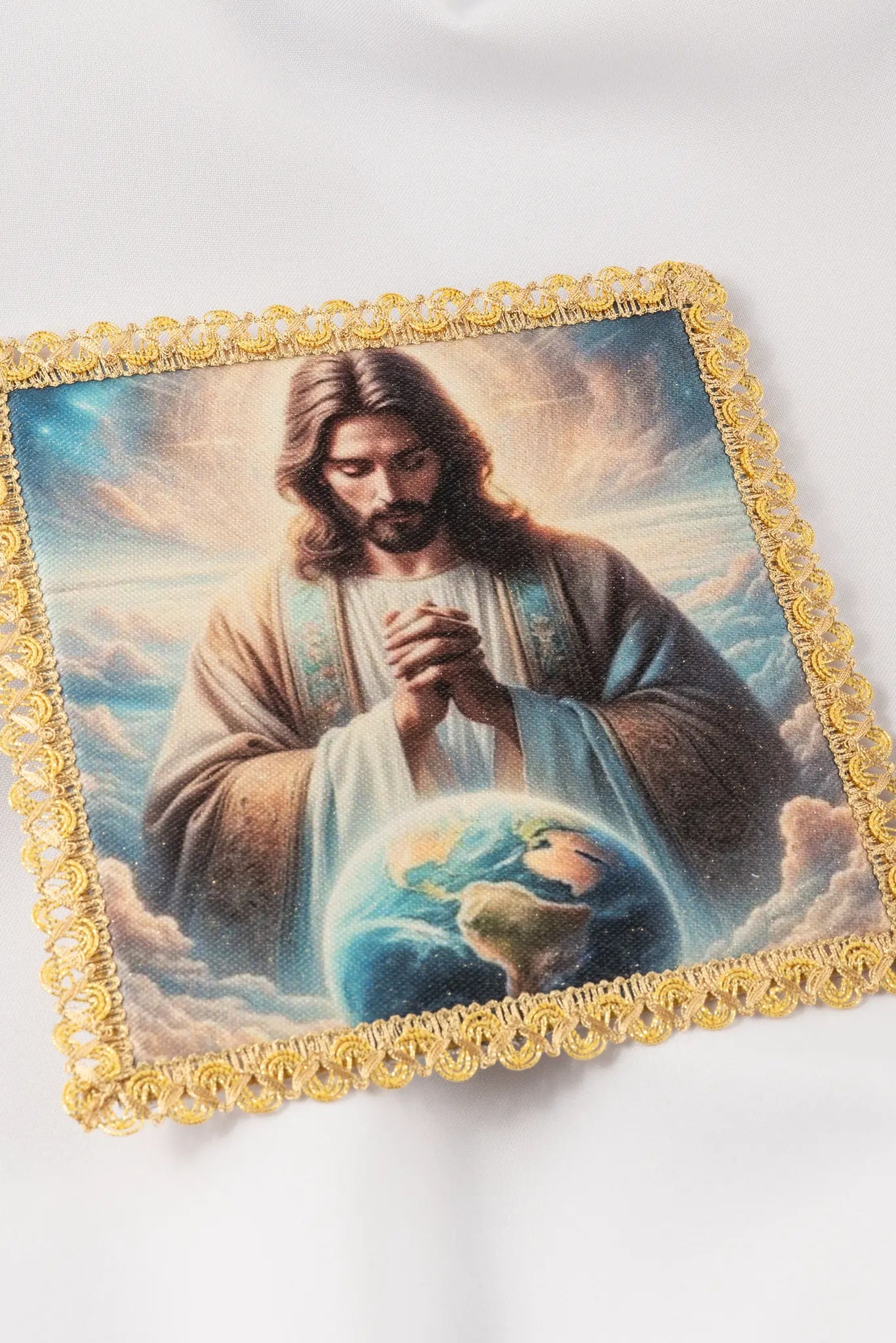 Paño corporal con la imagen de Cristo Rey del Universo