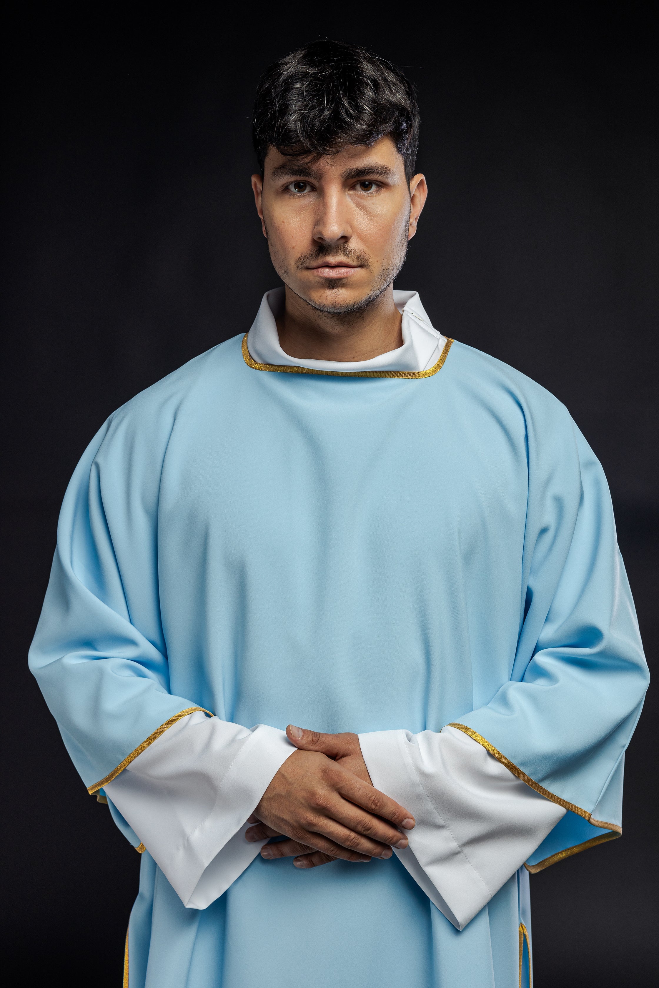 Dalmáticas lisas con ribete dorado azul