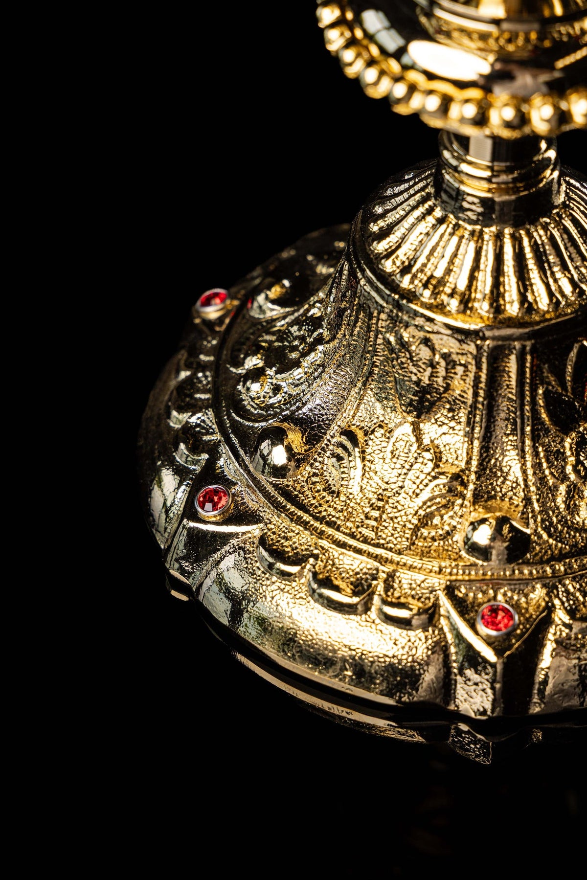 Gold-plated chalice with Baroque plant motifs and faux rubies, base close-up