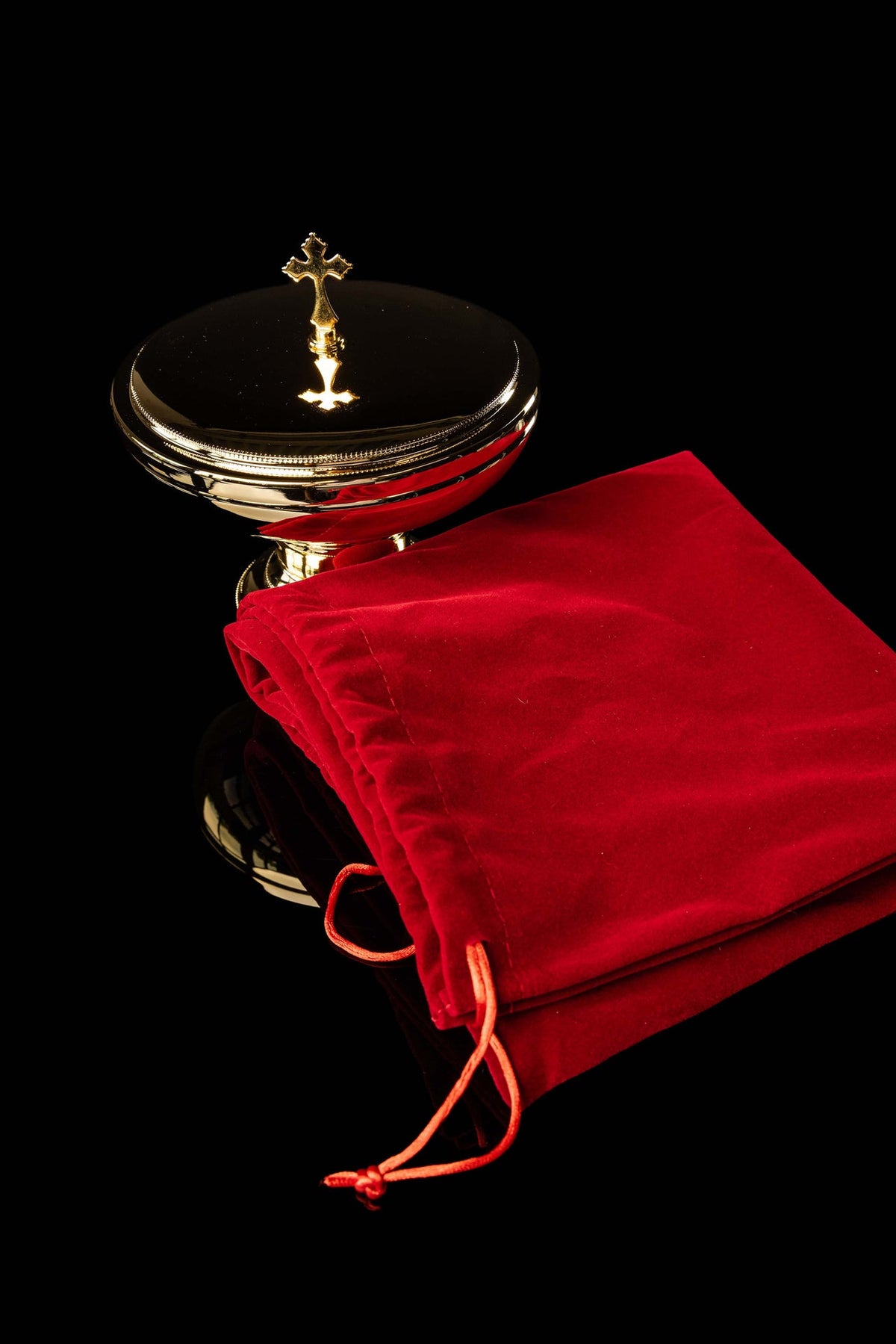 Gold-plated brass ciborium with cross finial and red carrying case, view