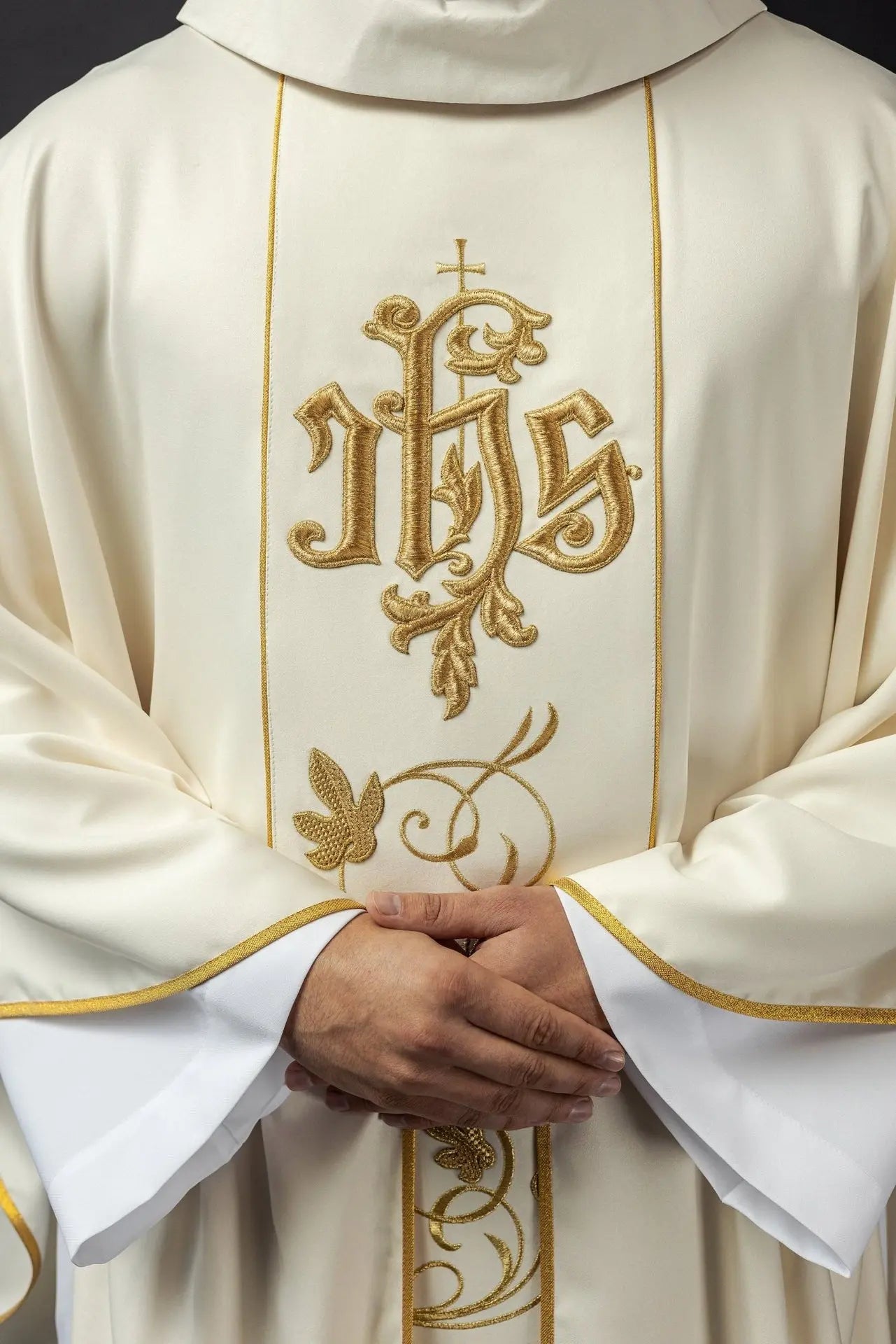 Ecru liturgical chasuble with richly decorated belt with floral motif and IHS