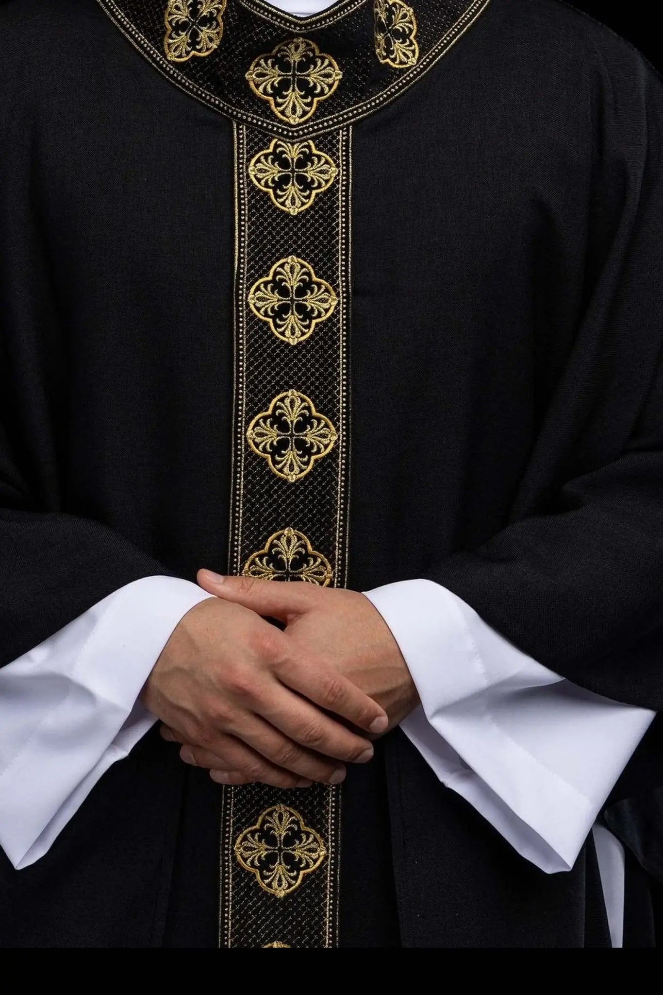 Black chasuble with embroidered band and collar with crosses