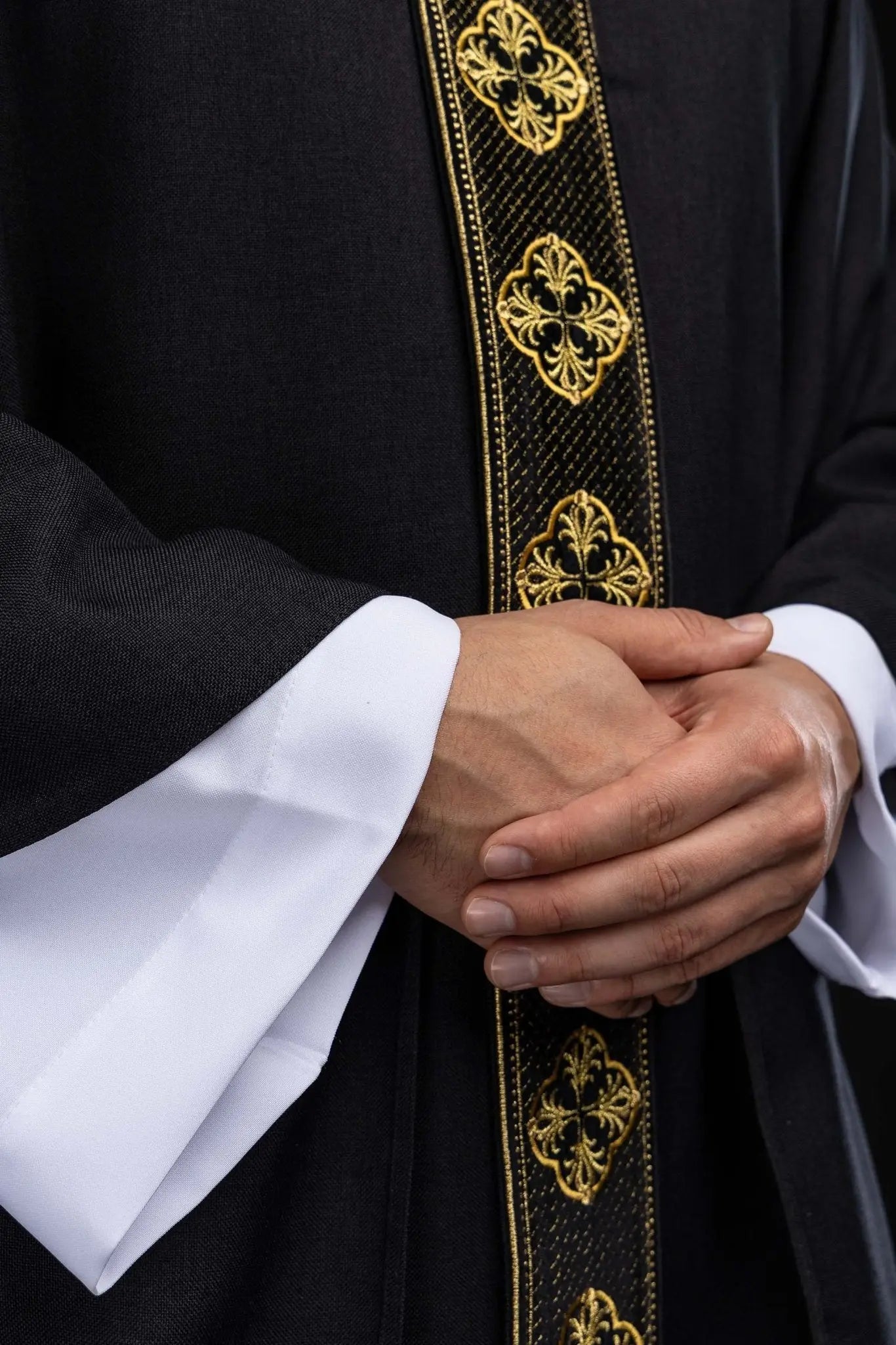 Black chasuble with embroidered band and collar with crosses