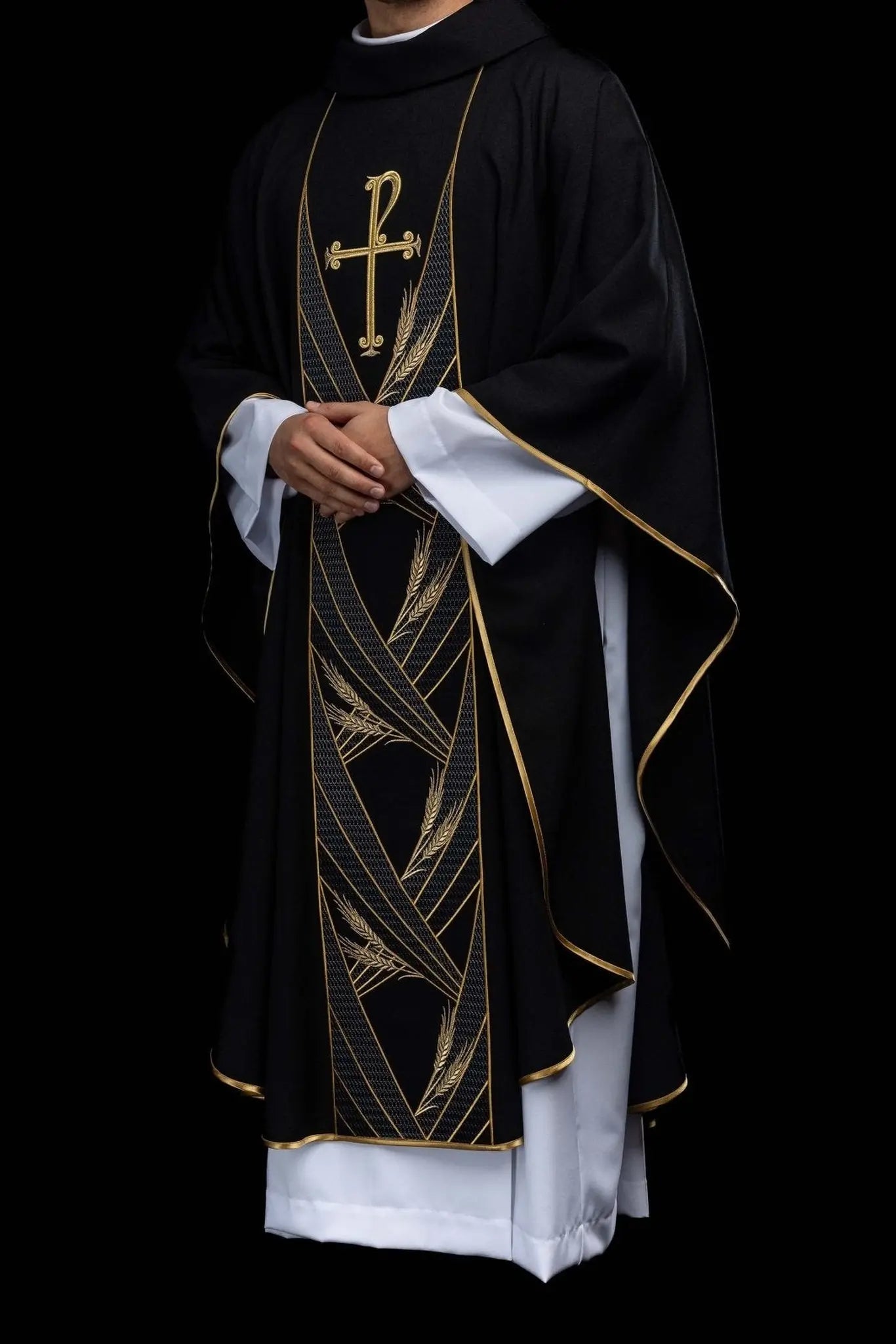 Black chasuble with embroidered PAX band and wheat motif