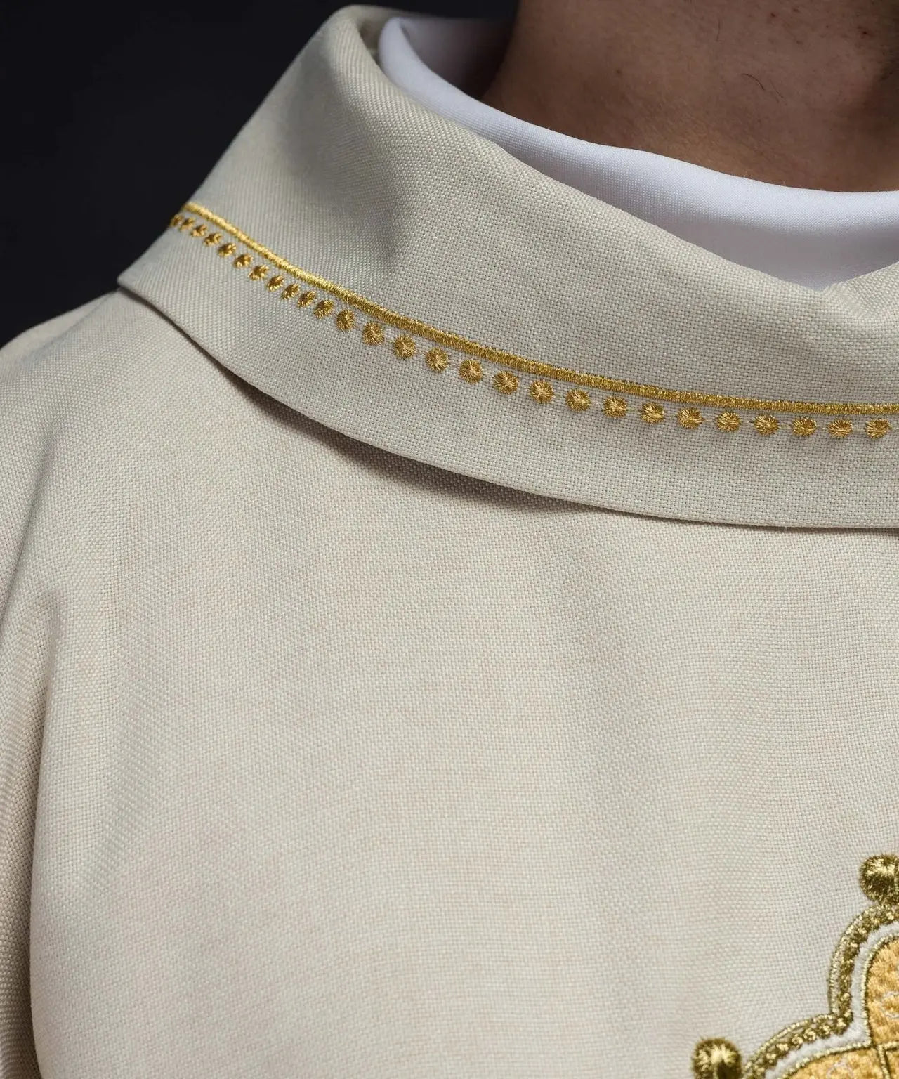 Chasuble with embroidered cross and gold trim on collar in ecru color