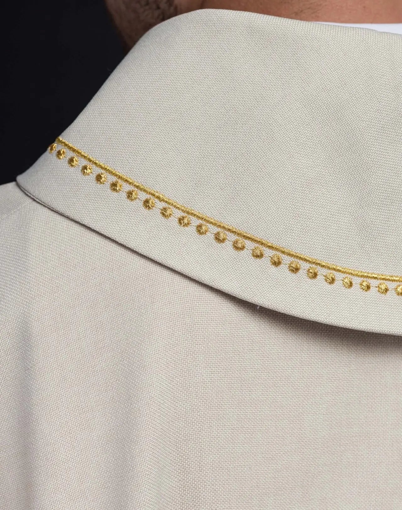 Chasuble with embroidered cross and gold trim on collar in ecru color